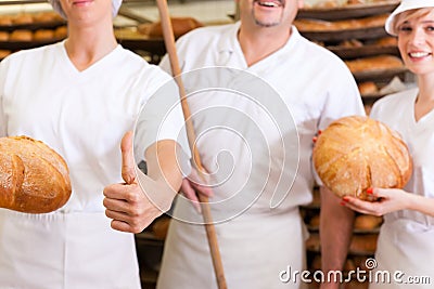 Baker with his team in bakery