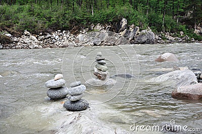 Balanced zen stones in river