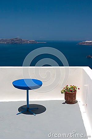 Balcony with blue table and re