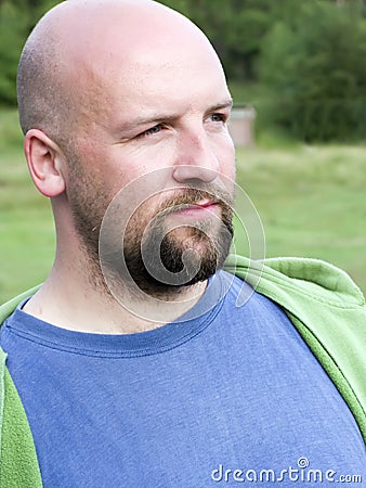 Bald bearded man portrait