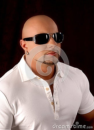 Bald guy wearing fashion sunglasses