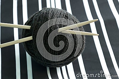 Ball of black woolen thread