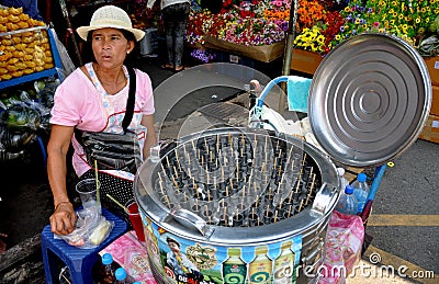 Bangkok, Thailand: Woman Selling Iced Fruit Sticks