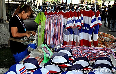 Bangkok, Thailand: Woman Selling Thai Political Souvenirs