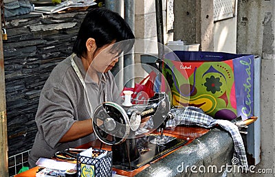 Bangkok, Thailand: Woman Working at Outdoor Sewing Machine