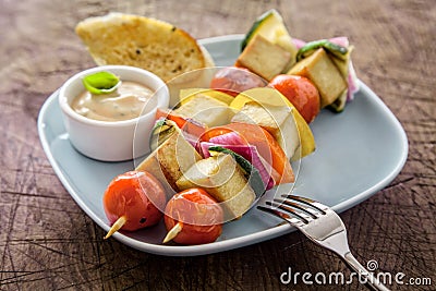 Barbecued halloumi and vegetable kebabs