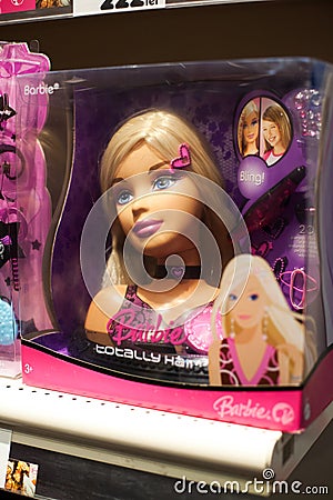 Barbie doll on shelf