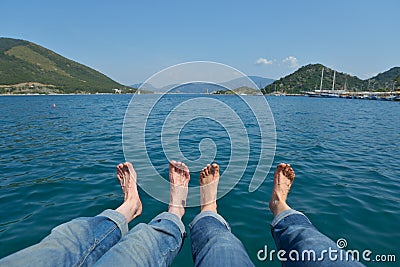 Bare feet against the sea