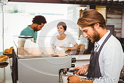 Barista making a cup of coffee