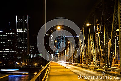 Bascule bridge across the river in the night lighting