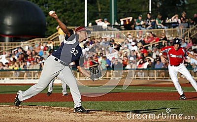 Baseball pitcher throwing ball