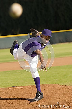 Baseball Pitcher Throwing Ball