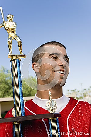 Baseball Player With Trophy