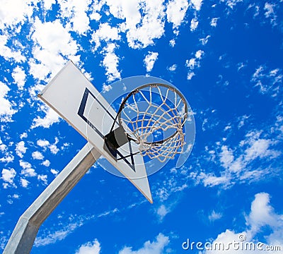 Basket hoop in a vibrant blue sky