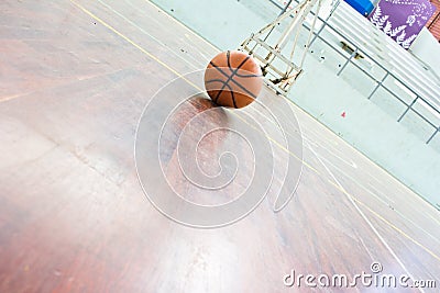 Basketball ball over floor