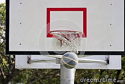 Basketball board and basketball ball