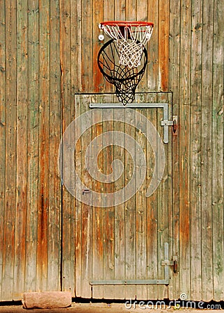 Basketball net on ancient door