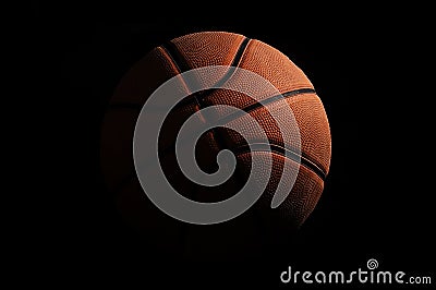 Basketball over black background