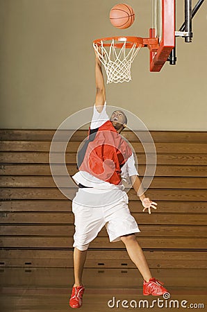 Basketball Player Misses Slam Dunk