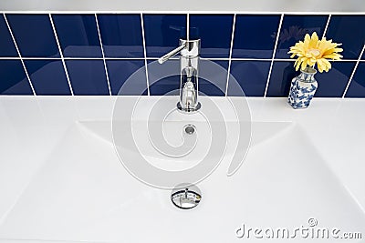 Bathroom Faucet Over White Sink