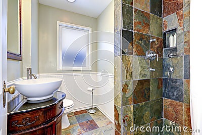 Bathroom interior iwth colorful tile wall trim