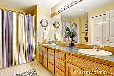 Bathroom interior with large vanity cabinet