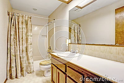 Bathroom with large mirror