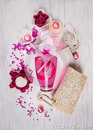 Bathroom set with glass pink bottle , sponge, scrub , oil balls,sea salt, and bath flowers