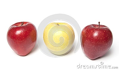Be different - three red and yellow apples