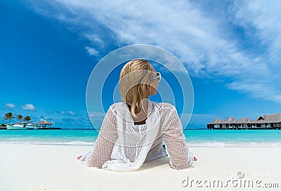 Beach vacation. Hot beautiful woman enjoying looking view of beach ocean