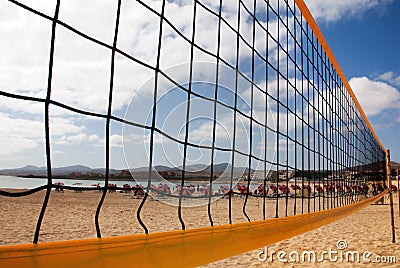 Beach volleyball net and beach