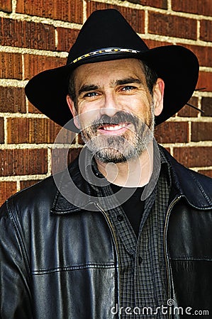 Bearded man in cowboy hat