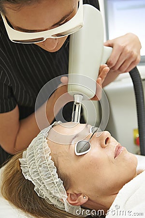 Beautician Carrying Out Fractional Laser Treatment