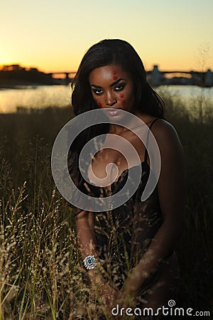 Beautiful African-american woman wearing black lingerie