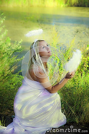 Beautiful angel girl in forest
