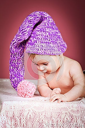 Beautiful baby in knitted cap