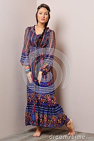 http://thumbs.dreamstime.com/x/beautiful-barefoot-woman-long-blue-dress-26531891.jpg