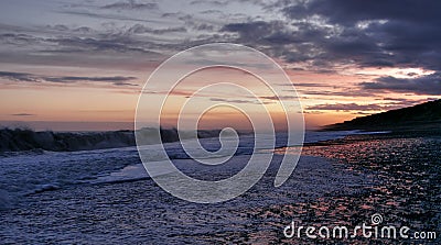 Beautiful beach in New Zealand during the sunset