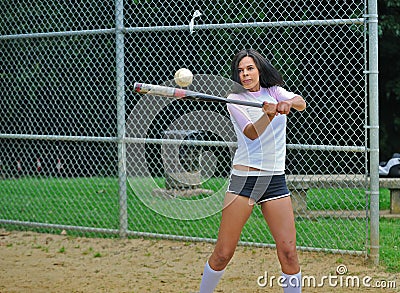 Beautiful biracial young female softball player