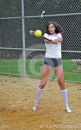 Beautiful biracial young female softball player