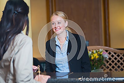 Beautiful blond hotel receptionist