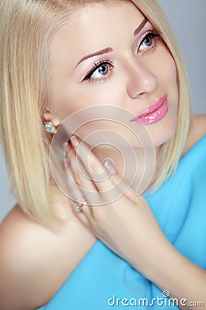 Beautiful blond woman portrait, makeup, skin care, bob hairstyle