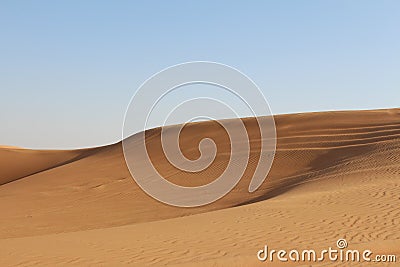 Beautiful blue sky in a deserted shifting Sands hot desert