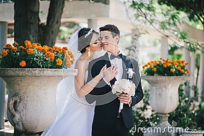 http://thumbs.dreamstime.com/x/beautiful-bride-groom-posing-yard-castle-happy-43945100.jpg