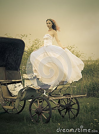 Beautiful bride and old carriage / retro style