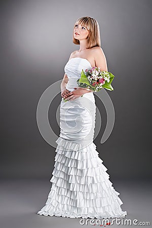 Beautiful bride in the wedding gown