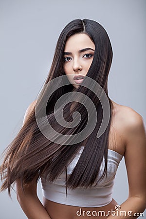Beautiful Brunette Girl with Healthy Long Hair