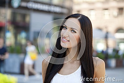 Beautiful business woman calling by phone