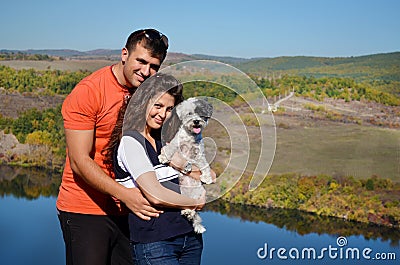 Beautiful couple hugging and laughing outdoor