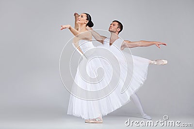 Beautiful dancing couple performing ballet.